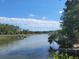 Scenic river view within the Dunes West community with dock and bridge at 101 Fresh Meadow Ln, Mount Pleasant, SC 29466