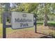 Community sign reading Middleton Park with beautiful landscaping and mature trees at 106 Chedburg Dr, Goose Creek, SC 29445
