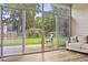 Sunroom featuring large windows with backyard views and a comfortable seating area for relaxing at 106 Chedburg Dr, Goose Creek, SC 29445