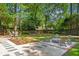 Backyard patio featuring outdoor seating and mature landscaping at 1061 Law Ln, Mount Pleasant, SC 29464