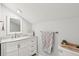 Bathroom with a marble countertop vanity, ample lighting, and a modern faucet at 1061 Law Ln, Mount Pleasant, SC 29464