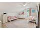 Bedroom with bright lighting, a pink theme, and comfortable furniture at 1061 Law Ln, Mount Pleasant, SC 29464
