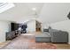 Bonus room featuring skylights, modern decor, and comfortable seating at 1061 Law Ln, Mount Pleasant, SC 29464