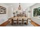 Bright dining room with a large window offering natural light and backyard views at 1061 Law Ln, Mount Pleasant, SC 29464