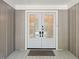 Inviting entryway featuring a double front door with decorative glass panels at 1061 Law Ln, Mount Pleasant, SC 29464