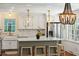 Charming kitchen with stainless steel appliances and a marble backsplash at 1061 Law Ln, Mount Pleasant, SC 29464
