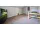 Upstairs bedroom with TV and carpet at 110 Terry Ave, Summerville, SC 29485