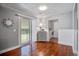 Inviting dining area with sliding glass doors, hardwood floors, and stylish gray decor at 110 Terry Ave, Summerville, SC 29485
