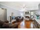 Spacious living room with hardwood flooring, a fireplace, and comfortable seating at 110 Terry Ave, Summerville, SC 29485