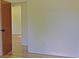 Spacious bedroom with wood-look floors and neutral walls, ready for personalization at 1101 Stuart Dr, Moncks Corner, SC 29461