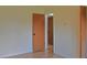 Neutral bedroom featuring wood-look floors, closet, and ensuite bathroom at 1101 Stuart Dr, Moncks Corner, SC 29461