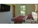 Cozy bedroom with a large window and stylish furnishings at 1101 Stuart Dr, Moncks Corner, SC 29461
