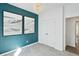 Stylish bedroom with a unique accent wall, closet, and modern chandelier at 115 Moscato Ln, Summerville, SC 29485