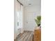 Entryway featuring natural light from the window and decorated with a plant and stylish decor at 115 Moscato Ln, Summerville, SC 29485