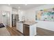 Modern kitchen with an island, stainless steel appliances, and granite countertops at 115 Moscato Ln, Summerville, SC 29485