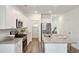 Well-equipped kitchen featuring granite countertops, stainless steel appliances, and white cabinets at 115 Moscato Ln, Summerville, SC 29485