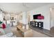 Open-concept living space with a kitchen island, dining area, and cozy seating at 115 Moscato Ln, Summerville, SC 29485