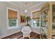 Bright bathroom features a clawfoot tub, hardwood floors, and stylish decor at 1193 River Rd, Johns Island, SC 29455