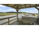 Scenic waterfront dock with seating, overlooking tranquil marsh views and providing boat access at 1193 River Rd, Johns Island, SC 29455