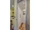 Home elevator with light wood floors and light green walls, offering convenient accessibility between floors in style at 1193 River Rd, Johns Island, SC 29455