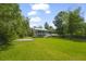 Charming house with a sprawling green lawn, inviting curb appeal, and classic architectural details at 1193 River Rd, Johns Island, SC 29455