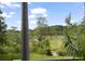 Enjoy this amazing home with marsh views from the porch, with a long walkway through the grass at 1193 River Rd, Johns Island, SC 29455