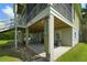 This home features a convenient outdoor shower on the lower level, ideal for rinsing off after outdoor activities at 1193 River Rd, Johns Island, SC 29455