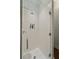 Walk-in shower with white subway tile and geometric flooring at 1193 River Rd, Johns Island, SC 29455