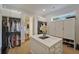 A view of the main bedroom walk-in closet with storage and an island at 1193 River Rd, Johns Island, SC 29455