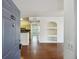 Inviting entryway with hardwood floors leading to kitchen and living area at 1300 Park West Blvd # 822, Mount Pleasant, SC 29466