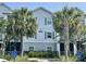 Charming light-blue building adorned by lush palm trees and marked by address '800' at 1300 Park West Blvd # 822, Mount Pleasant, SC 29466
