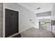 Exterior hallway with staircase, concrete floor, and view of outdoor green space at 1300 Park West Blvd # 822, Mount Pleasant, SC 29466