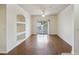 Bright living room featuring hardwood floors and sliding glass doors to balcony at 1300 Park West Blvd # 822, Mount Pleasant, SC 29466