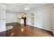 Open concept living area with hardwood flooring, ceiling fan and view of the kitchen at 1300 Park West Blvd # 822, Mount Pleasant, SC 29466