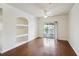Spacious living area with hardwood floors and built-in shelving at 1300 Park West Blvd # 822, Mount Pleasant, SC 29466