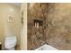 Bathroom with slate shower, built-in niche, and convenient commode at 1368 Little David Court Ct, Charleston, SC 29412