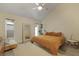Bright bedroom features a large bed, vaulted ceilings and a full length mirror at 1368 Little David Court Ct, Charleston, SC 29412