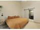 Bedroom with ensuite bathroom, natural light, and modern neutral decor at 1368 Little David Court Ct, Charleston, SC 29412