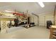 Organized garage with ample storage, exercise equipment, and workbench at 1368 Little David Court Ct, Charleston, SC 29412