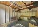 View of shed interior with lawnmower, rake, shelves, and miscellaneous stored items at 1368 Little David Court Ct, Charleston, SC 29412