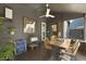 Cozy sun room with dining table, ceiling fan, and outdoor view at 1368 Little David Court Ct, Charleston, SC 29412