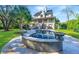 Home exterior overlooking backyard and the swimming pool with large patio at 1447 Headquarters Plantation Dr, Johns Island, SC 29455