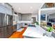 Modern kitchen with stainless steel appliances, white countertops, and gray cabinetry at 1447 Headquarters Plantation Dr, Johns Island, SC 29455
