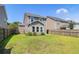 This spacious backyard includes a well-maintained lawn and a fenced-in yard at 1484 Milldam Pass, Johns Island, SC 29455