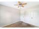Comfortable carpeted bedroom featuring a ceiling fan and closet for storage at 1484 Milldam Pass, Johns Island, SC 29455