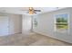 Inviting bedroom enhanced by two windows with lush outdoor views and a neutral palette at 1484 Milldam Pass, Johns Island, SC 29455