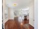 Inviting entryway showcasing gleaming hardwood floors and an open floor plan with abundant natural light at 1484 Milldam Pass, Johns Island, SC 29455