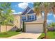 This two-story home has a well-maintained lawn, attached two-car garage and a welcoming front entry at 1484 Milldam Pass, Johns Island, SC 29455