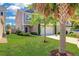 Charming two-story home with a manicured lawn and an attached two-car garage at 1484 Milldam Pass, Johns Island, SC 29455