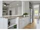 Modern kitchen featuring granite countertops, stainless steel appliances, and convenient bar seating at 1491 Greenshade Way, Mount Pleasant, SC 29464